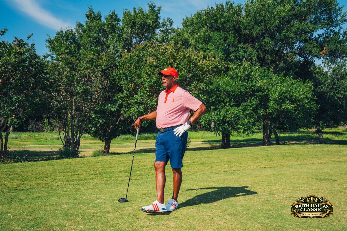 Golfer posing on the course