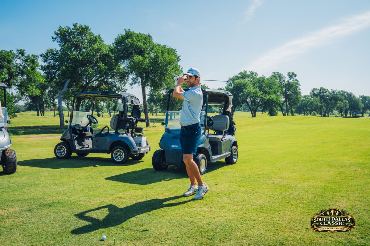 Golfer mid-swing on the fairway
